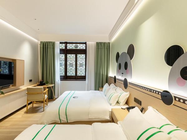 Xishu Garden Inn : photo 3 de la chambre chambre familiale