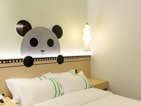 Xishu Garden Inn : photo 2 de la chambre chambre familiale