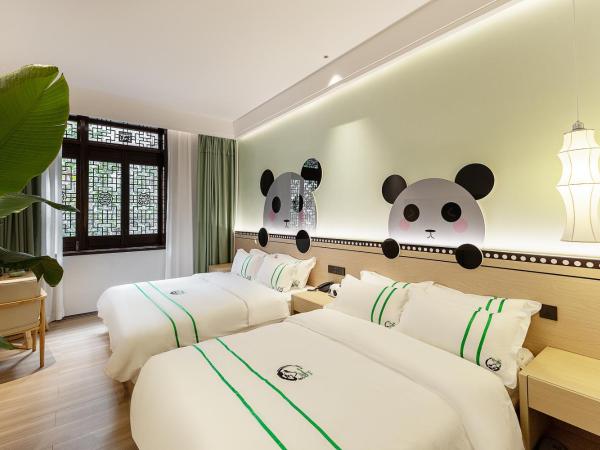 Xishu Garden Inn : photo 1 de la chambre chambre familiale