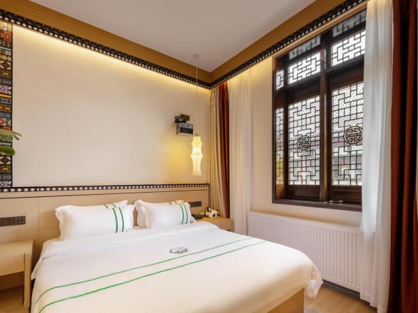 Xishu Garden Inn : photo 4 de la chambre suite 2 chambres