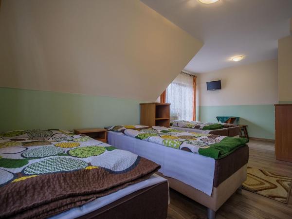 U KOMINKA : photo 3 de la chambre chambre familiale avec balcon