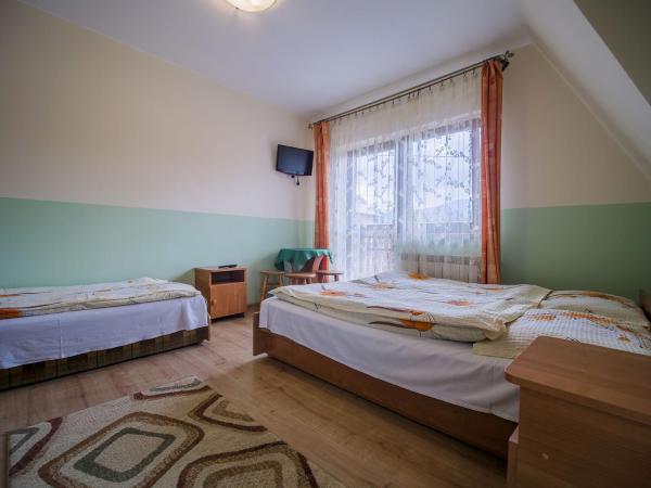 U KOMINKA : photo 1 de la chambre chambre triple avec salle de bains privative