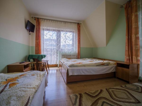 U KOMINKA : photo 2 de la chambre chambre triple avec salle de bains privative