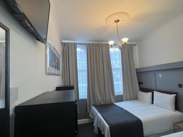 Plaza London Hotel : photo 7 de la chambre hébergement supérieur avec salle de bains privative