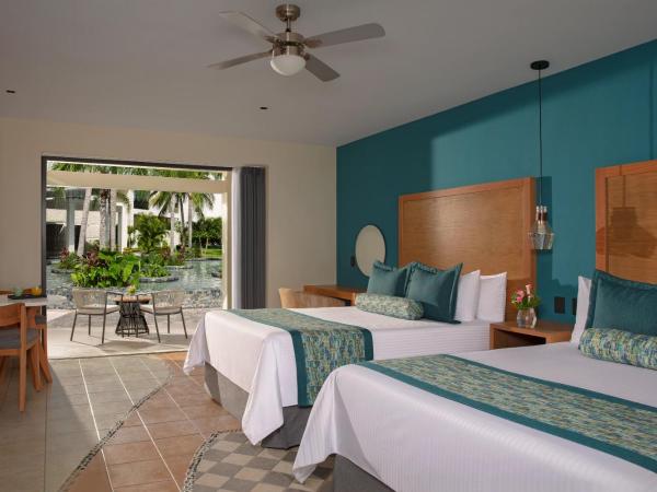 Dreams Cozumel Cape Resort & Spa : photo 2 de la chambre suite junior preferred club avec lits doubles - vue tropicale