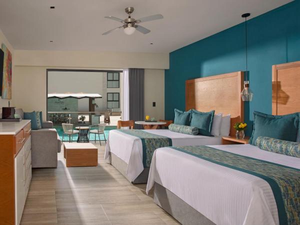 Dreams Cozumel Cape Resort & Spa : photo 2 de la chambre suite junior preferred club avec lits doubles - vue sur piscine