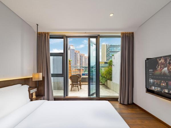 Wuyu Hotel - Chongqing Jiangbei Airport : photo 4 de la chambre chambre double deluxe avec balcon