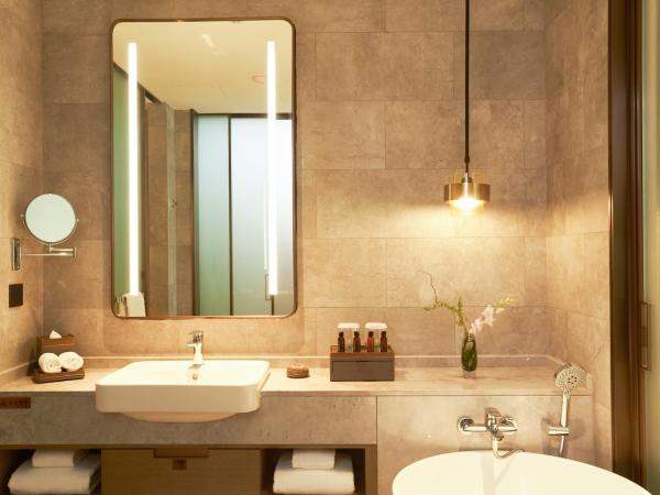 LN Dongfang Hotel Pazhou-Free Shuttle Buses and Registration Counter for Purchasing Agents during the Canton Fair : photo 3 de la chambre chambre lits jumeaux exécutive