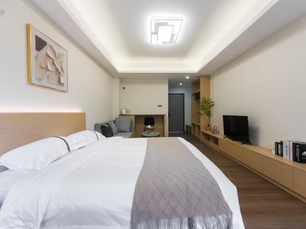 Weisu Service Apartment - Shenzhen Songpingshan Science and Technology Park Store : photo 3 de la chambre chambre lit queen-size exécutive 