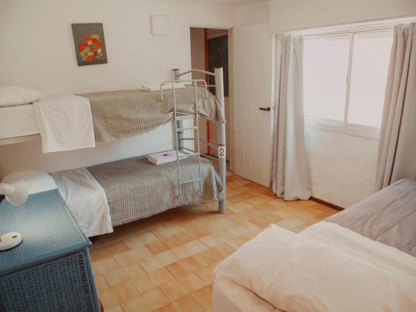 Hostal Schilling : photo 1 de la chambre lit dans un dortoir de 4 lits