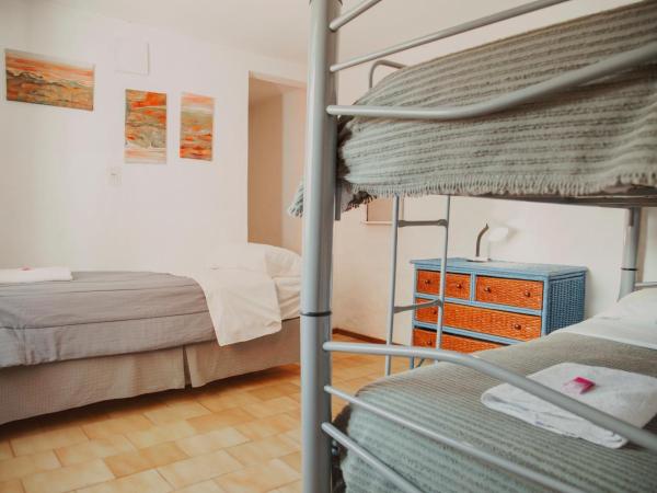 Hostal Schilling : photo 2 de la chambre lit dans un dortoir de 4 lits