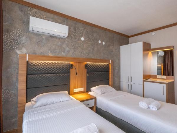 Hotel Sunday Beach : photo 4 de la chambre chambre lits jumeaux avec vue sur l'arrière-pays