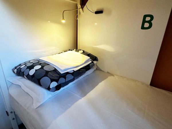 Mio Hostel : photo 2 de la chambre  lit dans dortoir de 4 lits avec salle de bains privative