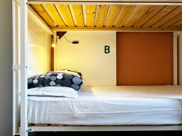 Mio Hostel : photo 5 de la chambre  lit dans dortoir de 4 lits avec salle de bains privative