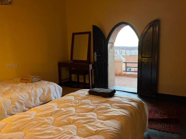 Kasbah de Tifoultoute : photo 6 de la chambre chambre lits jumeaux avec terrasse