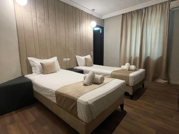 Cadé Hotel : photo 1 de la chambre chambre lits jumeaux