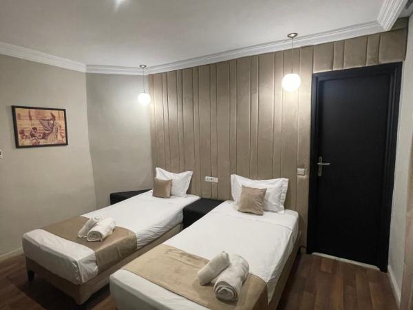 Cadé Hotel : photo 2 de la chambre chambre lits jumeaux