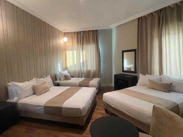 Cadé Hotel : photo 1 de la chambre chambre familiale deluxe