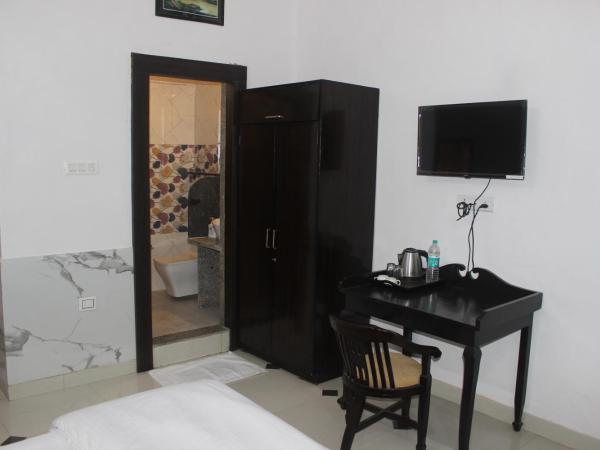 Hotel Lasani Inn : photo 6 de la chambre chambre double deluxe (2 adultes + 1 enfant)