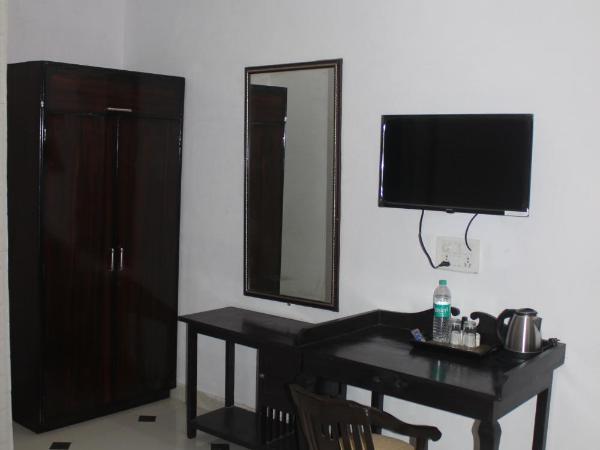 Hotel Lasani Inn : photo 8 de la chambre chambre double deluxe (2 adultes + 1 enfant)