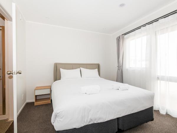 Aurora City Suites Motel : photo 5 de la chambre suite de luxe 2 chambres avec baignoire spa