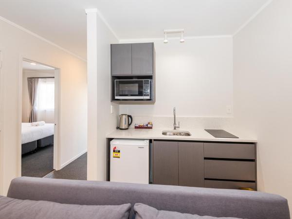 Aurora City Suites Motel : photo 1 de la chambre suite 2 chambres standard avec baignoire spa