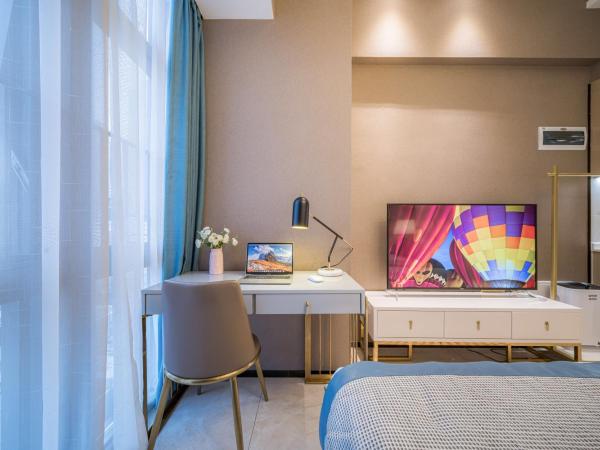 Gepai Executive Apartment - Shenzhen Futian Convention and Exhibition Center : photo 4 de la chambre deluxe executive king room (washing machine + refrigerator)