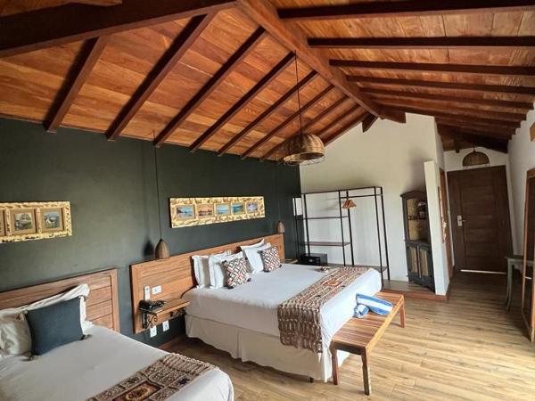 Pousada Villa Canaã : photo 7 de la chambre chambre triple avec balcon