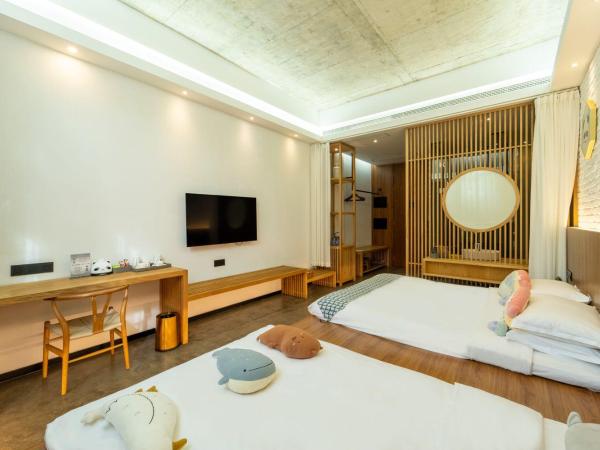 Lin Yin Art Hotel Shanghai(Pudong airport) : photo 3 de la chambre chambre familiale - vue sur jardin