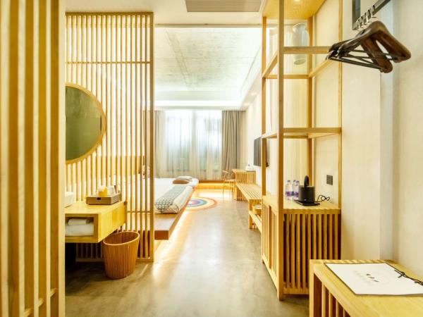 Lin Yin Art Hotel Shanghai(Pudong airport) : photo 5 de la chambre chambre familiale - vue sur jardin