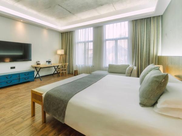 Lin Yin Art Hotel Shanghai(Pudong airport) : photo 3 de la chambre chambre lit queen-size deluxe