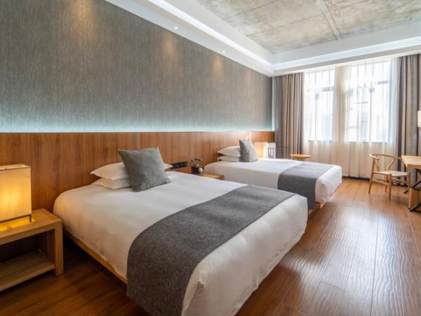 Lin Yin Art Hotel Shanghai(Pudong airport) : photo 5 de la chambre chambre lits jumeaux deluxe