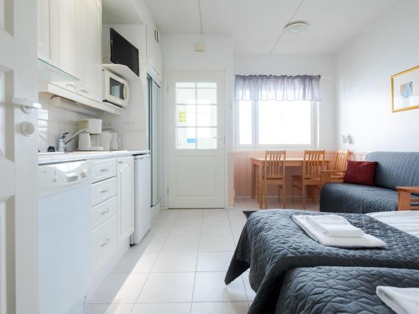 Lapland Hotels Sirkantähti : photo 1 de la chambre studio Économique avec sauna (2 adultes)