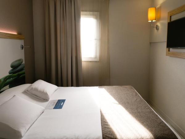 Kyriad Montpellier Sud - A709 : photo 5 de la chambre chambre standard - 1 lit double et 3 lits simples