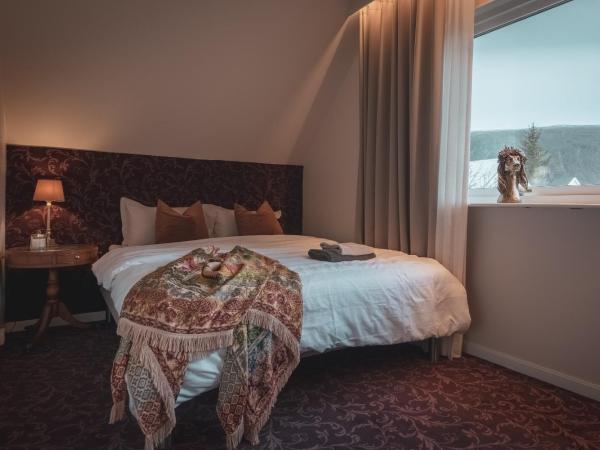 Villa Havblikk Tromsø : photo 1 de la chambre chambre lit queen-size - vue sur jardin