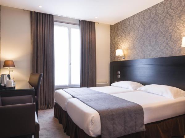 Hôtel Volney Opéra : photo 2 de la chambre chambre lits jumeaux classique