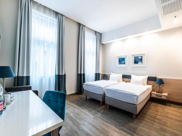 Atrium Fashion Hotel : photo 1 de la chambre chambre familiale