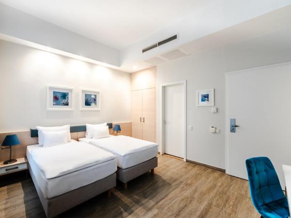 Atrium Fashion Hotel : photo 8 de la chambre chambre familiale