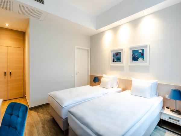 Atrium Fashion Hotel : photo 10 de la chambre chambre familiale