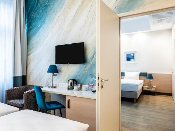 Atrium Fashion Hotel : photo 2 de la chambre chambre familiale