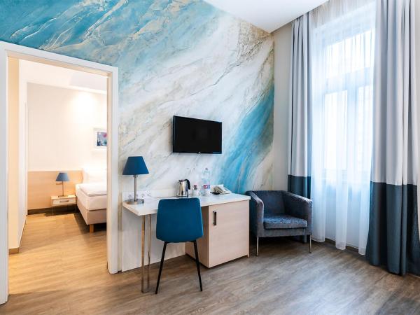 Atrium Fashion Hotel : photo 6 de la chambre chambre familiale