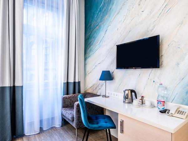 Atrium Fashion Hotel : photo 6 de la chambre chambre double ou lits jumeaux deluxe - vue sur ville