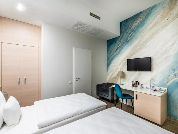 Atrium Fashion Hotel : photo 3 de la chambre chambre double ou lits jumeaux – vue sur atrium