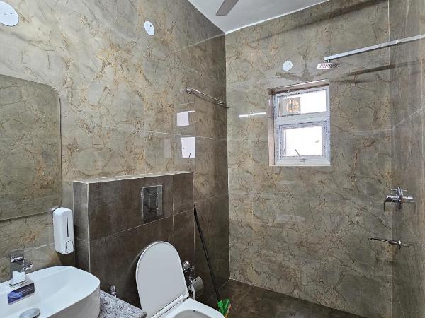 Place to stay in Gurugram : photo 4 de la chambre chambre double deluxe avec balcon