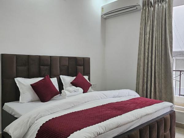 Place to stay in Gurugram : photo 6 de la chambre chambre double deluxe avec balcon