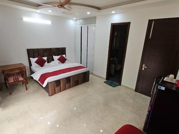 Place to stay in Gurugram : photo 7 de la chambre chambre double deluxe avec balcon