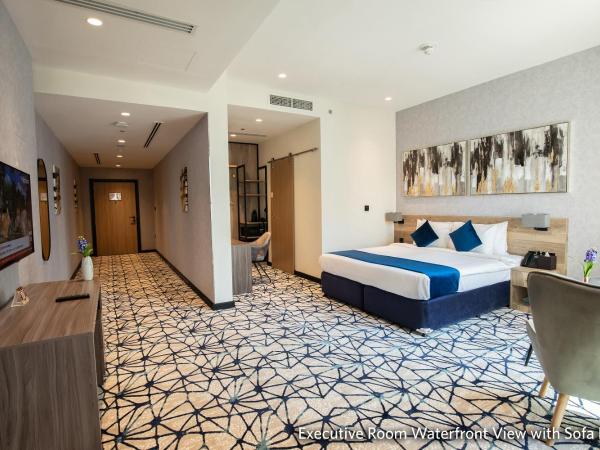 Grand Kingsgate Jaddaf Waterfront Hotel by Millennium : photo 2 de la chambre executive suite with living area