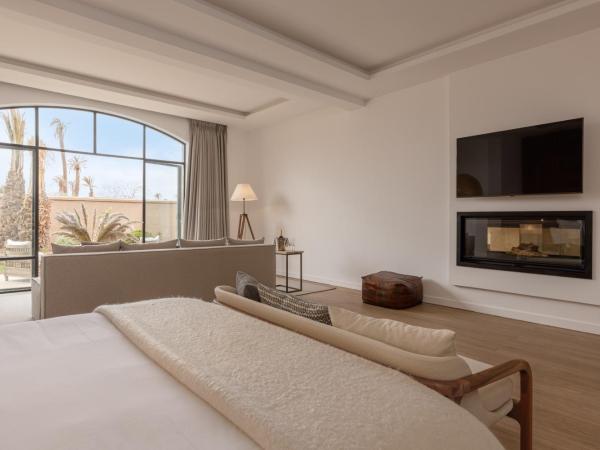 Ksar Char-Bagh Small Luxury Hotels : photo 1 de la chambre suite supérieure lit king-size
