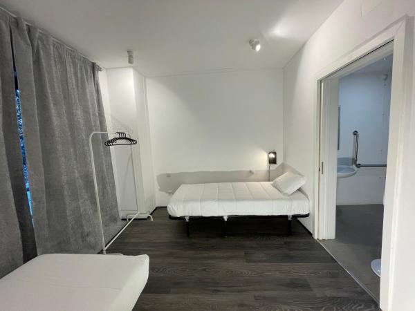 HI Parque das Nações - Pousada de Juventude : photo 1 de la chambre chambre lits jumeaux avec salle de bains privative - accessible aux personnes à mobilité réduite