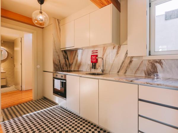 Aparthotel Oporto Palace : photo 10 de la chambre appartement - vue sur jardin